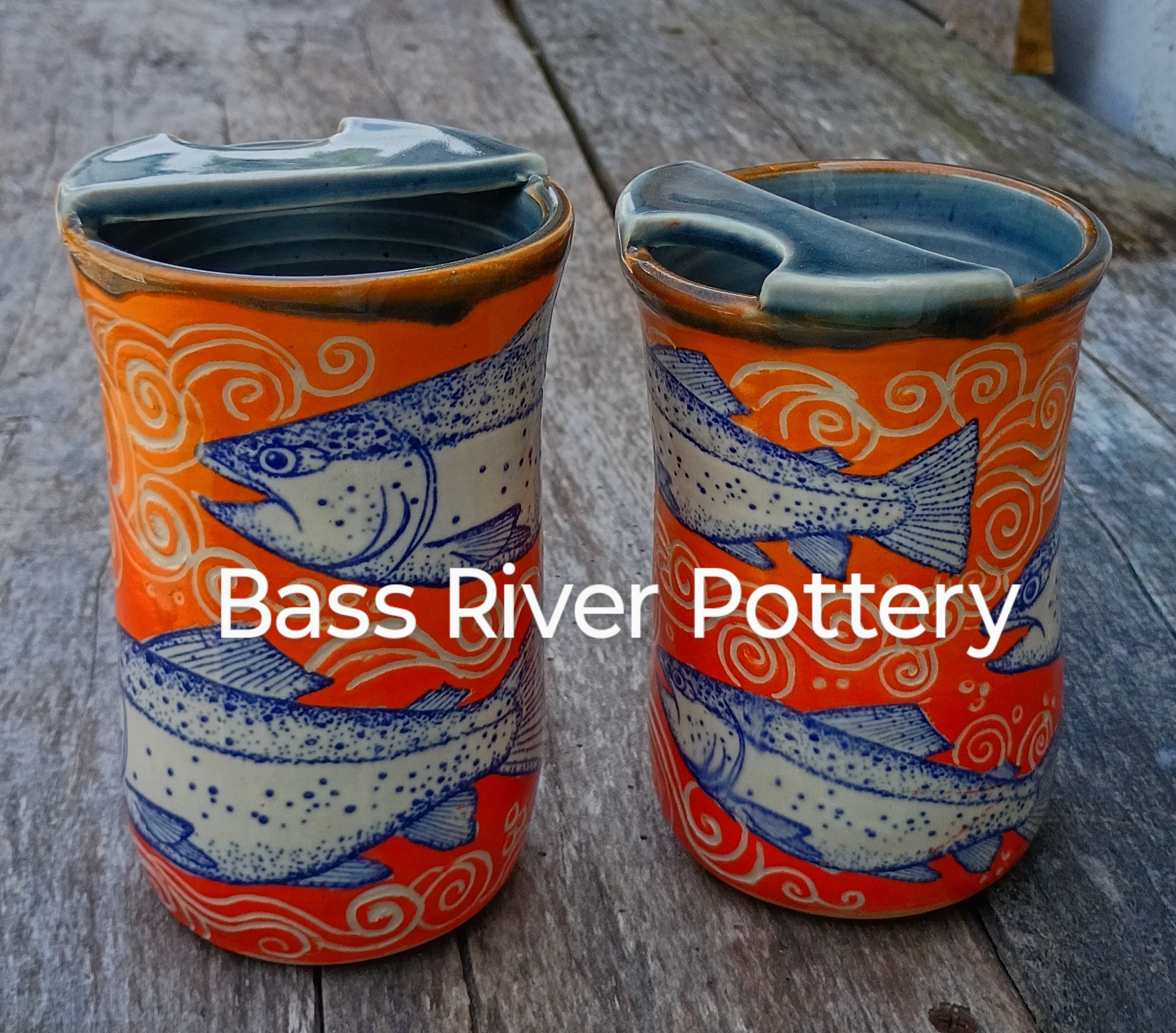 red and blue fish mugs